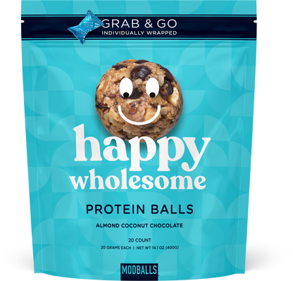 Almond coconut protein ball front of package with smiley face on the ball